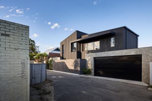 Behind this black box facade in an alleyway lies a Japanese-inspired 'oasis'